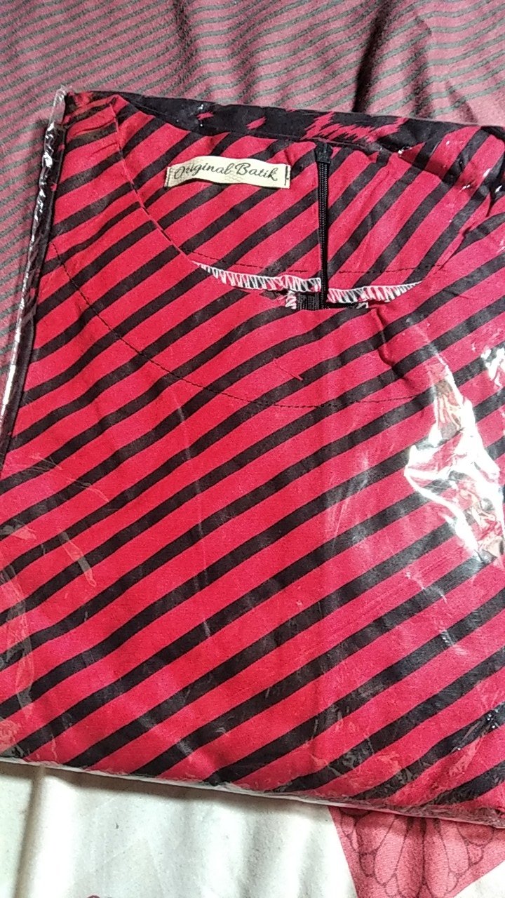 Dress Lancip Motif Tenun Troso