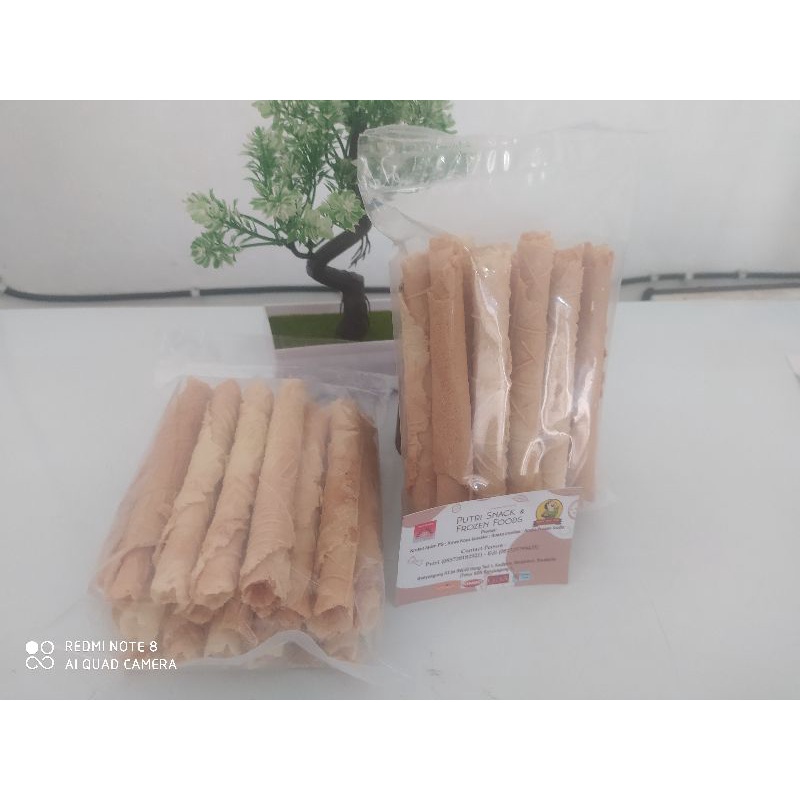 

Piscoklegit_ !! !! Kue Semprong Khas Solo Ii Semprongan Rolls Opak Solo Isi 21 Batang (Netto 200 Gr)
