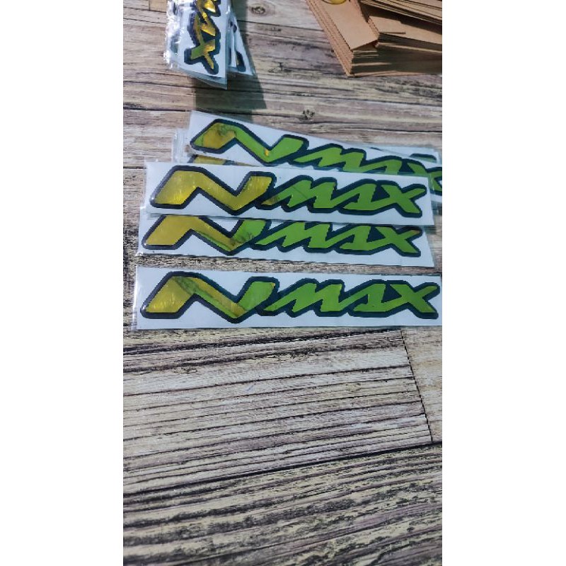 STICKER EMBLEM NMAX TIMBUL