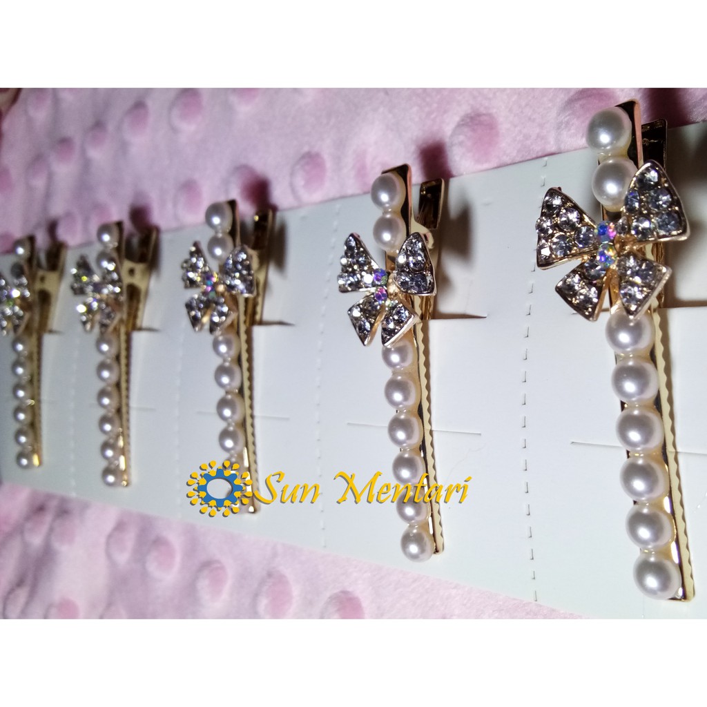 Jepitan Rambut Pita Gold Mutiara Diamond