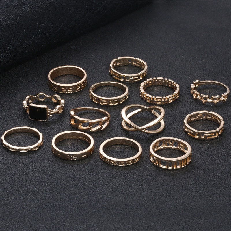 13pcs / Set Cincin Desain Bintang Warna Hitam Emas Gaya Punk Untuk Wanita