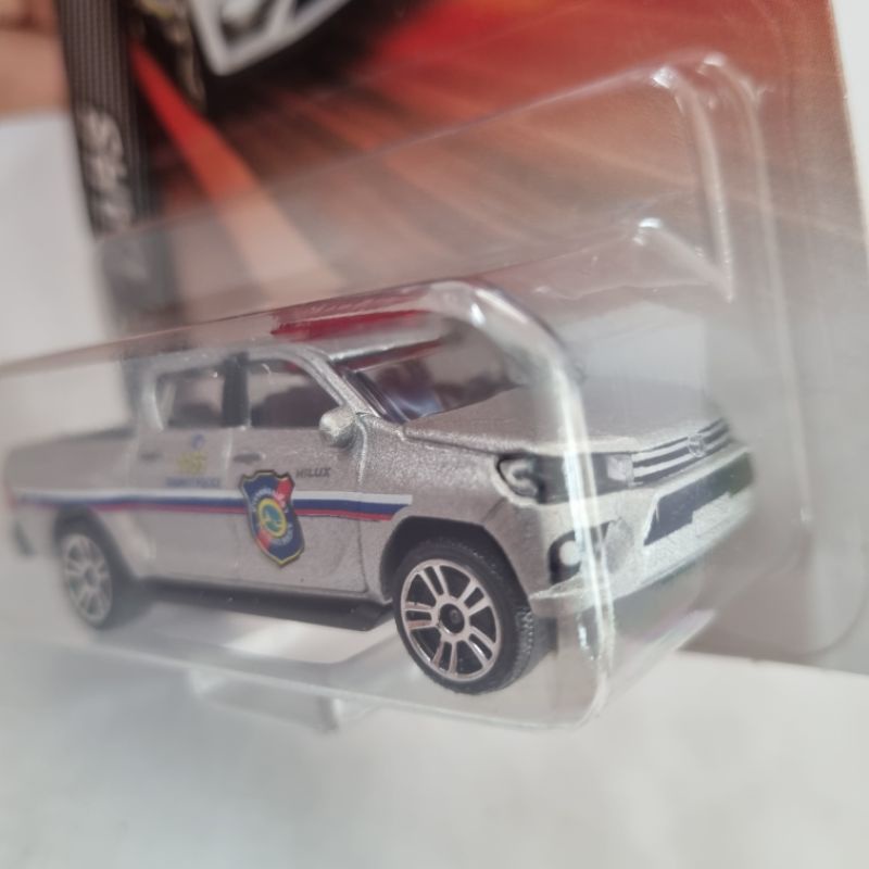 Diecast Majorette mobil pick up polisi Toyota Hilux Silver skala 64 International SOS