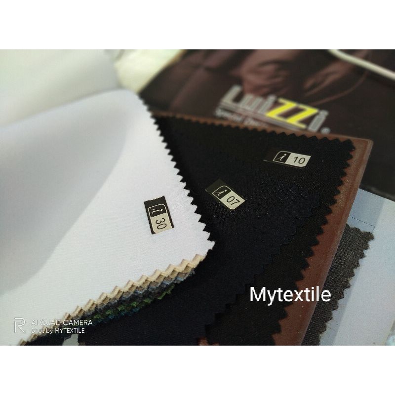 kain seragam Luizzi Hitam Putih Biru luizi