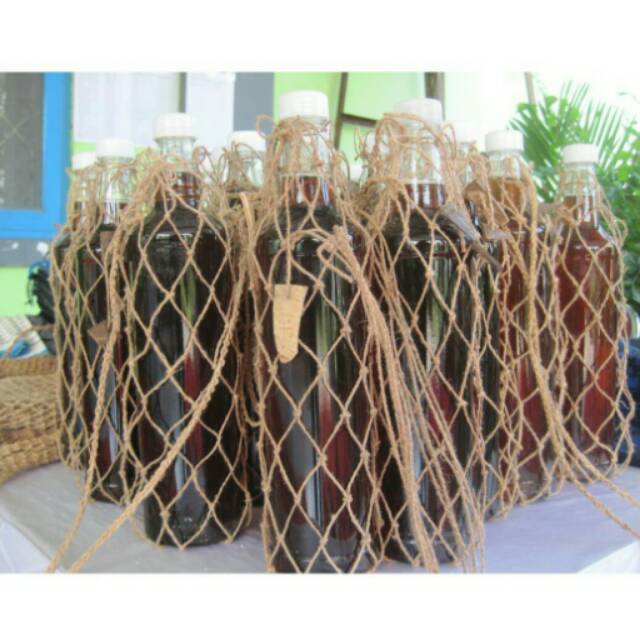 

Madu hitam 700 gram asli
