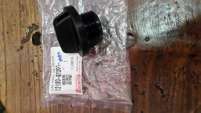 tutup oli xenia 1000cc