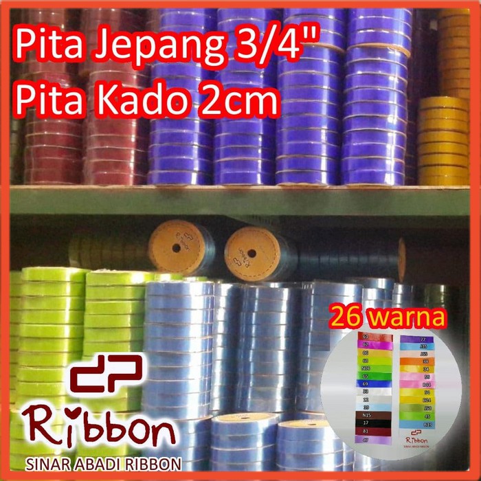 

Pita Kado Plastik Polos Aneka Warna Lebar 2cm Panjang 14 Meter 1 Roll