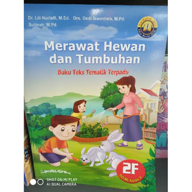 Buku teks tematik terpadu untuk kelas 2F II SD merawat hewan dan tumbuhan