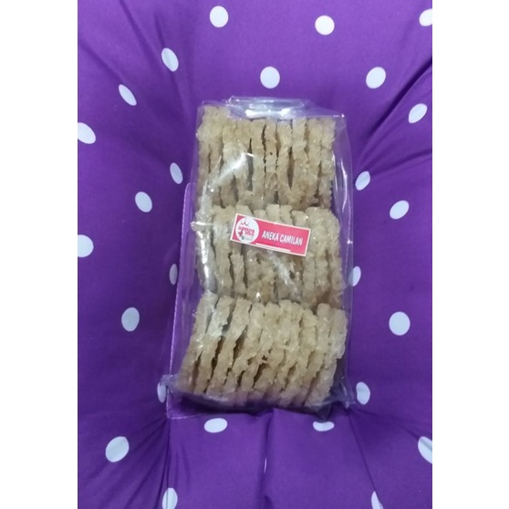 

RENGGINANG MENTAH (ISI 30 PCS/BUNGKUS) - TERASI - KETAN HITAM - BAWANG - MURAH