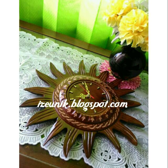 Jam dinding unik matahari dari kayu jati