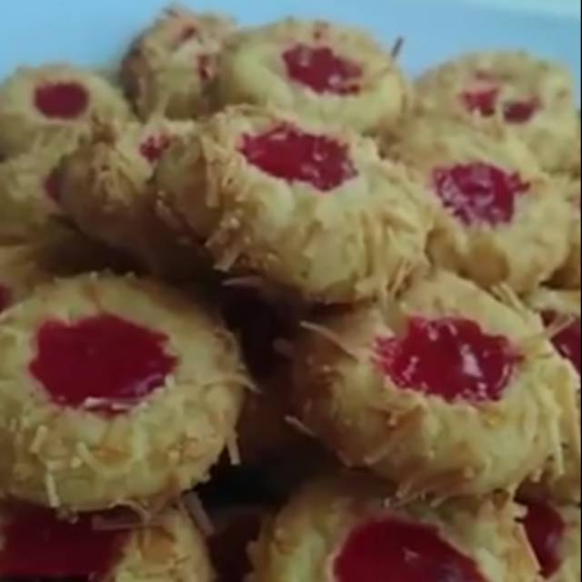 

Strawberry thumbprint cheese cookies.