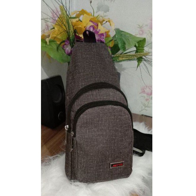 preloved tas selempang pria brand Asstin