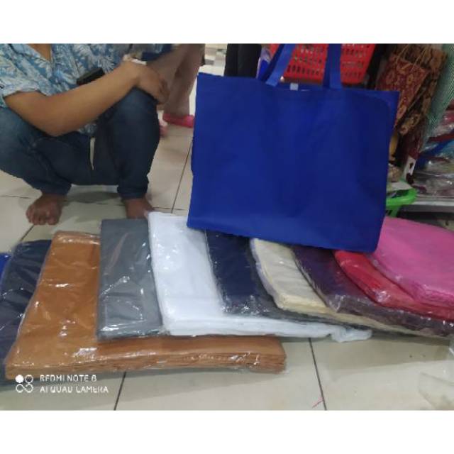 

Tas kain spunbond landscape jahit jumbo terlaris dan termurah isi 12pcs(40*14*50)bahan tebal