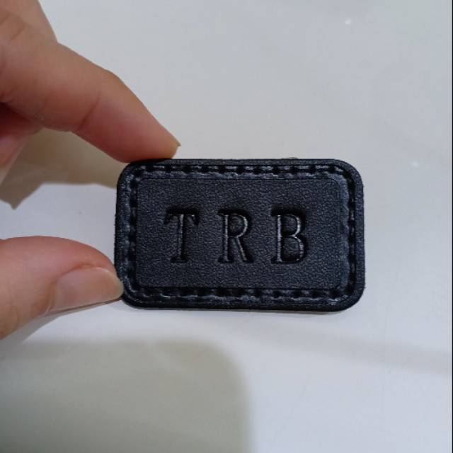 JASA EMBOSS TUMI tanpa warna