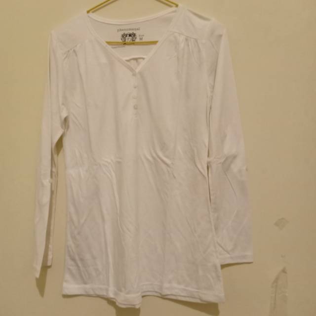 Preloved kaos wanita putih berkancing brand matahari phenomenal