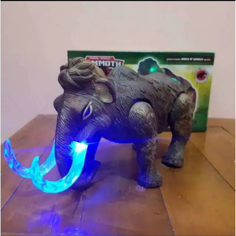 mainan gajah mammoth jalan Bersuara dan lampu