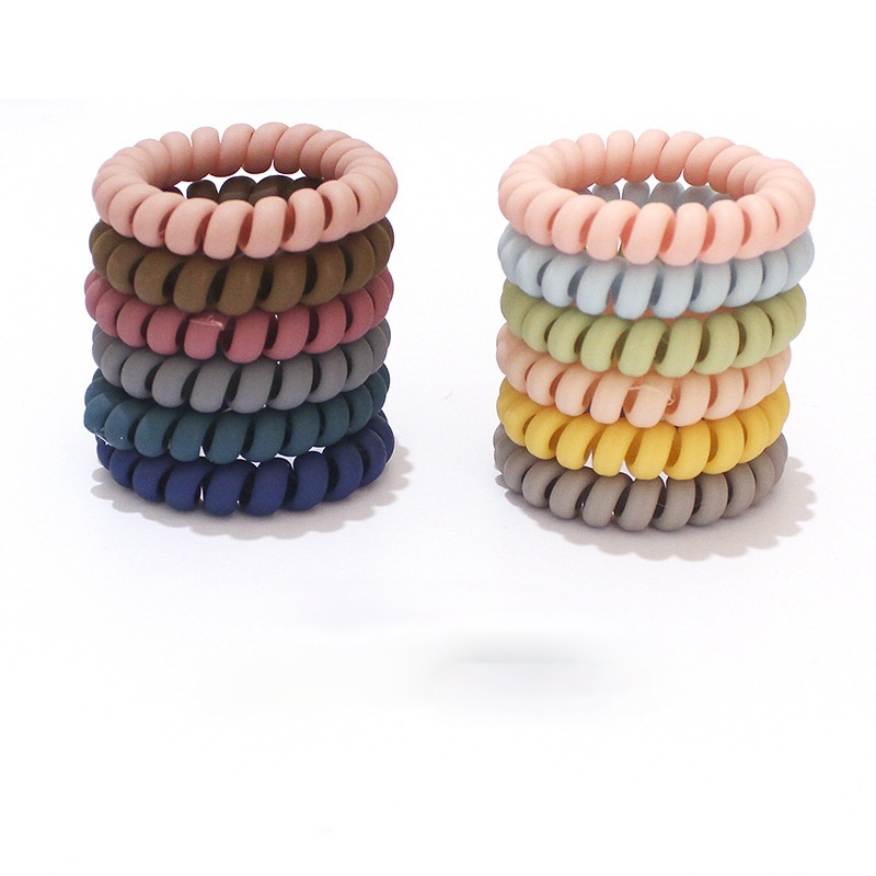10pcs / Kantong Jepit Rambut Elastis Bentuk Kabel Telepon Warna Permen Untuk Aksesoris Pelajar