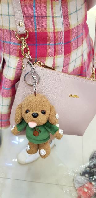 Dogie doll with blink bag charm