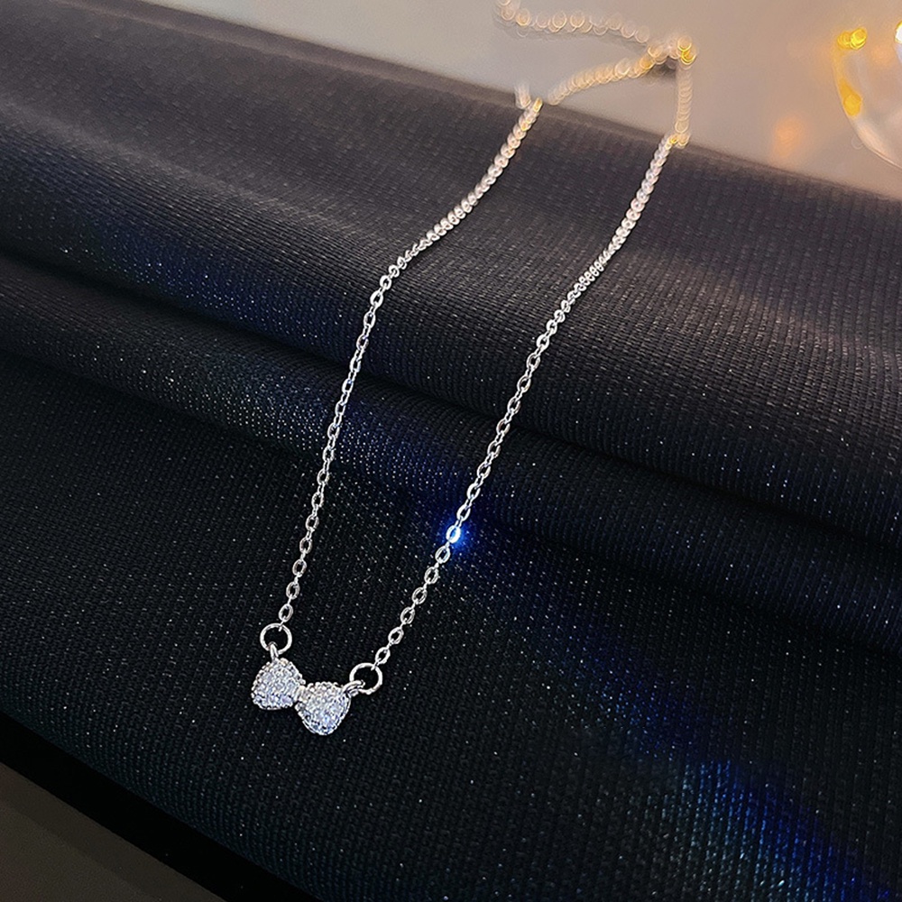 Kalung Choker Dengan Liontin Pita Untuk Wanita