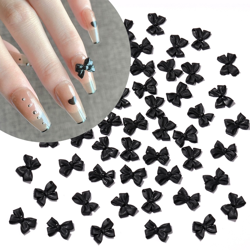 50pcs / Kantong Pita 3D Bahan Resin Warna Hitam Putih Untuk Nail Art