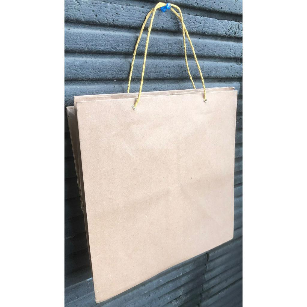 

Paperbag Tas Kertas Kraft Polos Goodie Bag 25 x 25 x 25 cm