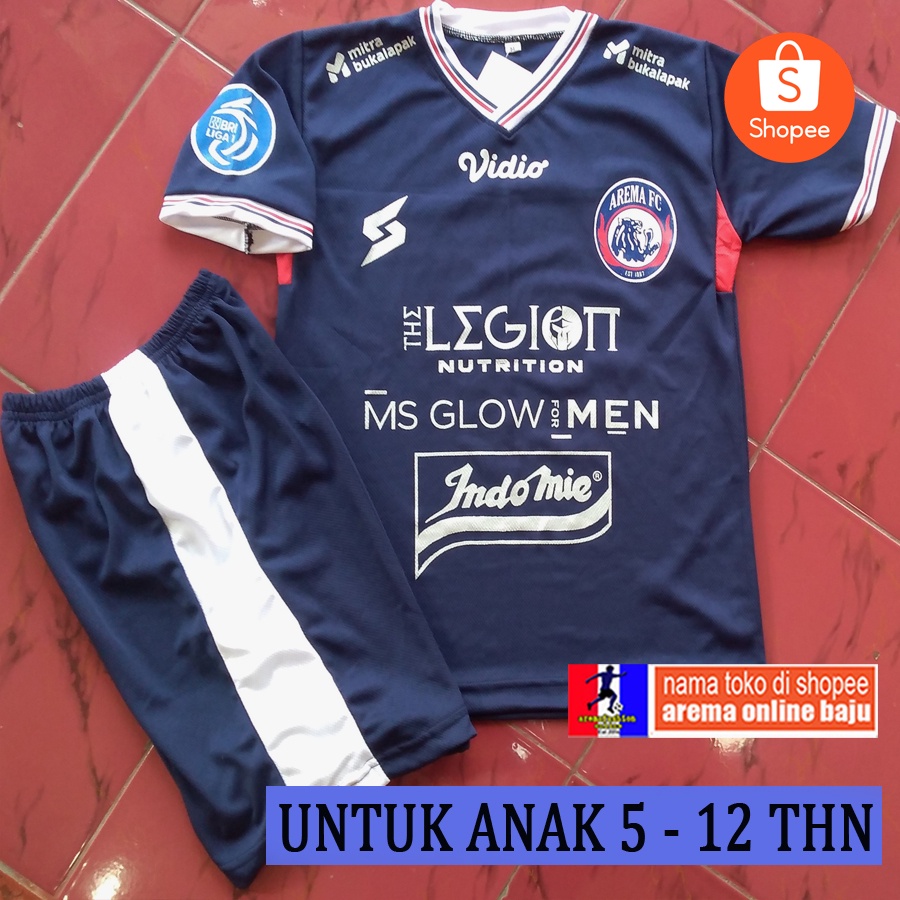 UNTUK ANAK SETELAN KAOS BAJU JERSEY AREMA FC 2023 BIRU HOME - AREMAFASHION ONLINE BAJU