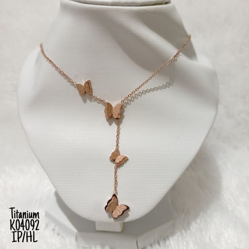 Kalung Titanium Kupu Tingkat K04092