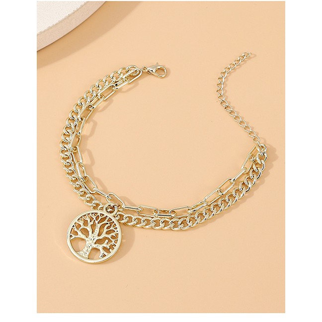 LRC Gelang Tangan Fashion Golden Round Life Tree Hollow Alloy Y64448