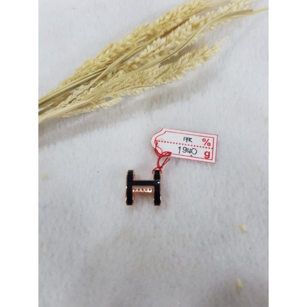 Liontin emas 75 huruf H