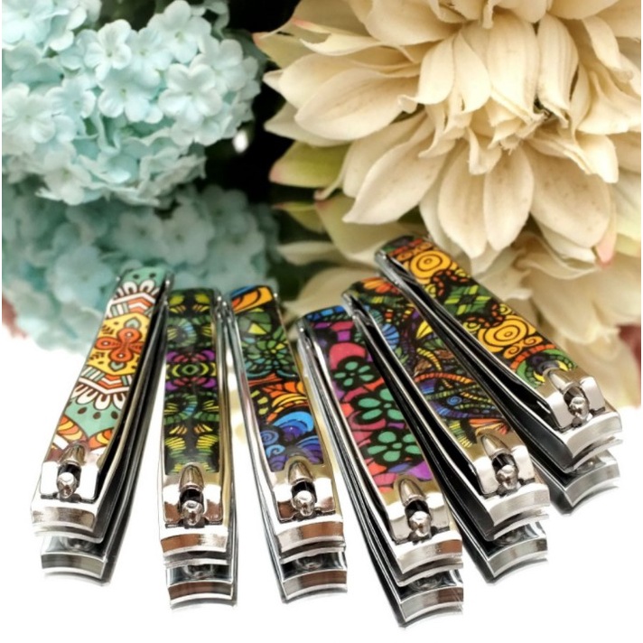 GUNTING KUKU RIGE BATIK