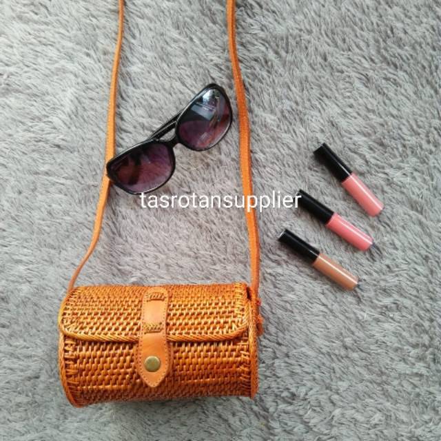 Tas ate tabung bulat