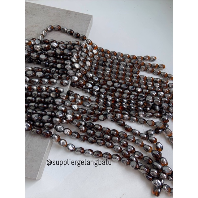 kristal CEKO KACANG SILVER brown quartz 10mm coklat PERAK oval cutting