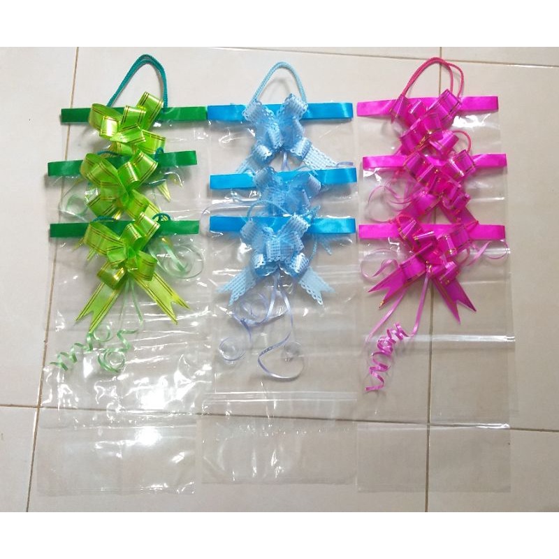 

tas snack dengan pita/ plastik snack/ plastik souvenir