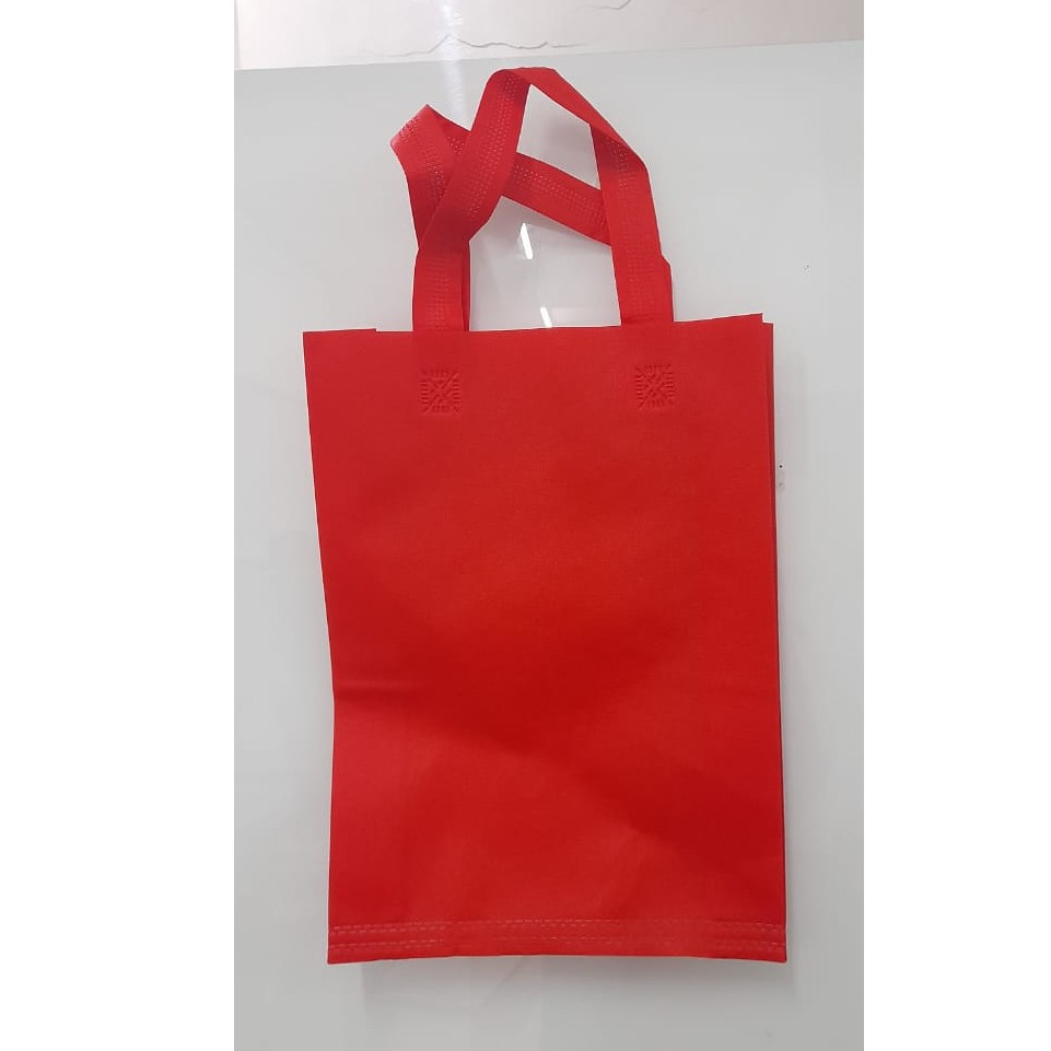 

Tas Press Spunbound Tali Goodie Bag Tas Belanja Warna Merah 25 cm x 35 cm