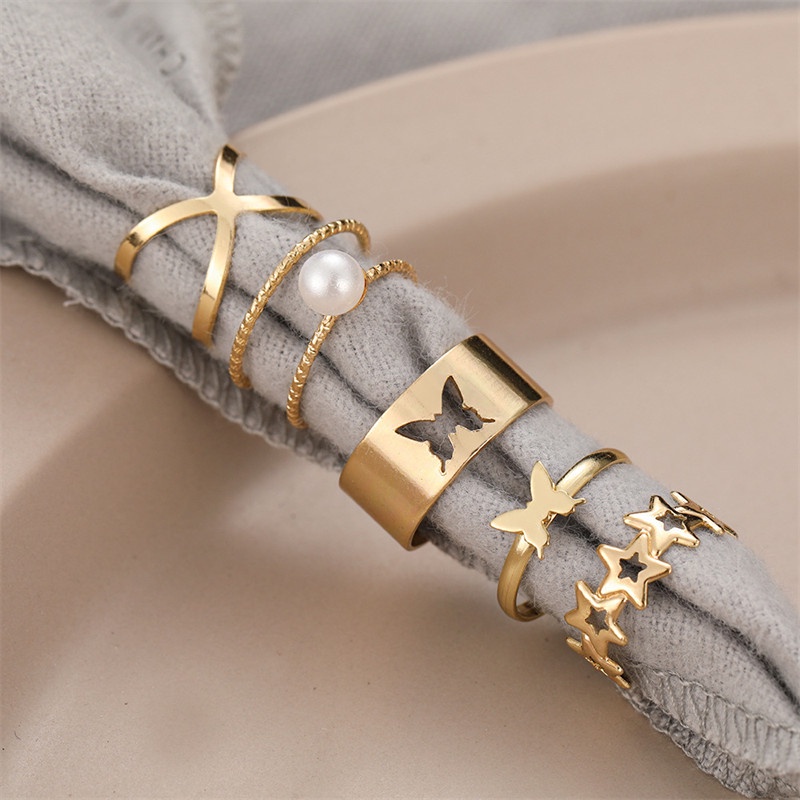 5pcs / Set Cincin Desain Kupu-Kupu Hollow Cross Aksen Mutiara Untuk Wanita