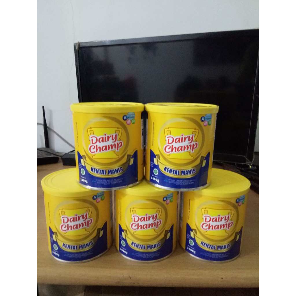 Susu Kaleng Kental Manis Dairy Champ 1kg Dapat 24 Pcs Produksi