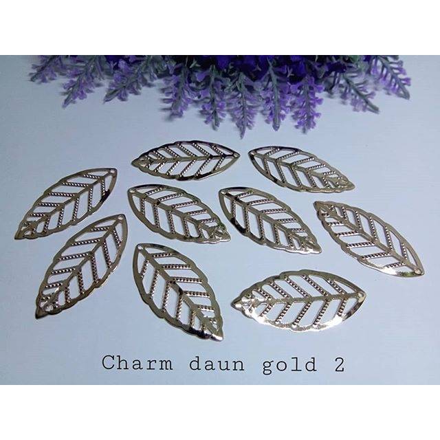 Charm daun gold 2