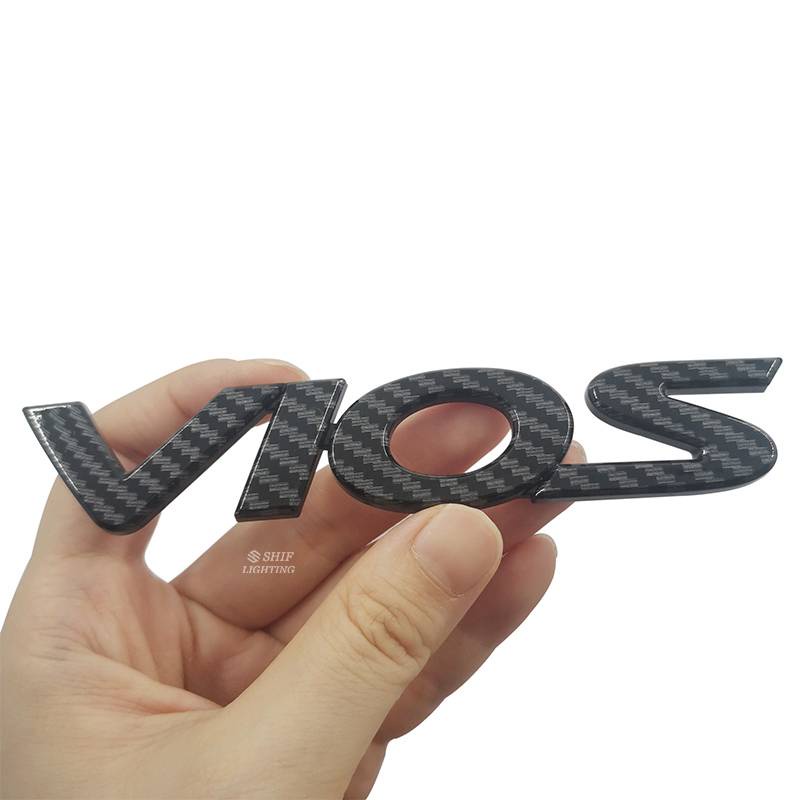 1 x Carbon Fiber ABS VIOS Letter Logo Car Auto Decorative Emblem Badge Sticker Decal Replacement for TOYOTA