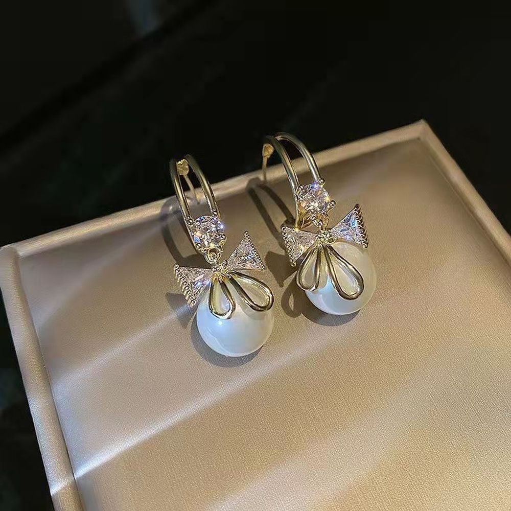 Anting Tusuk Lapis Silver Model Pita Dengan Mutiara Untuk Wanita