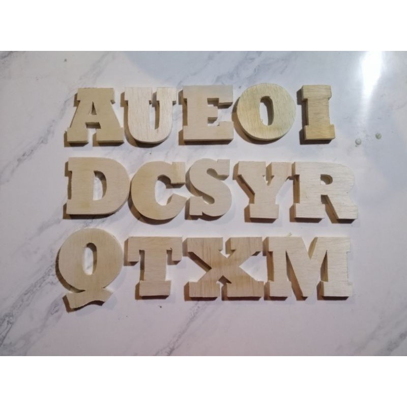 Huruf timbul Kayu