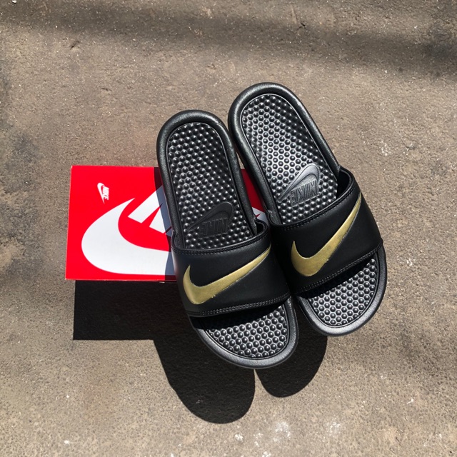 red nike slides gold swoosh