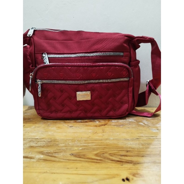 tas selempang warna merah