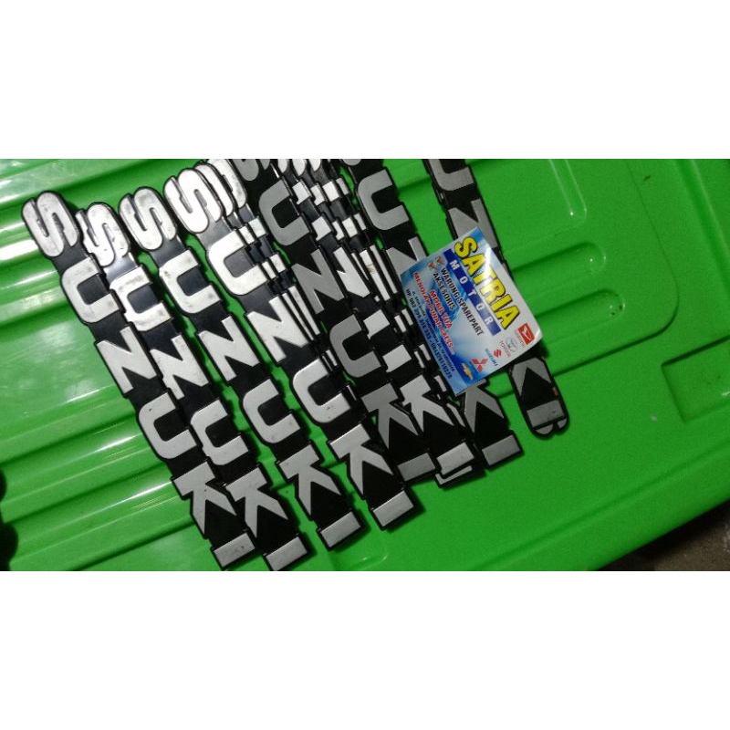 Emblem logo Suzuki katana carry Forza amenity esteem Jimny Sierra caribian