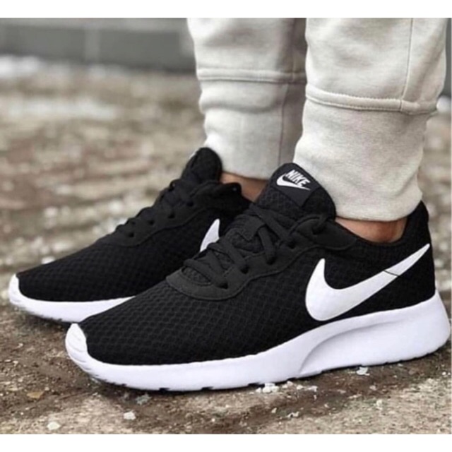 grey tanjun nike trainers