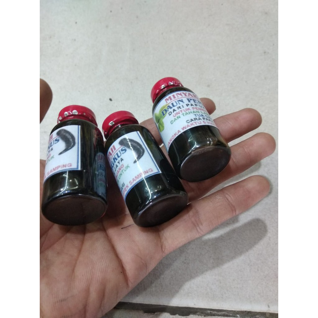 MINYAK URUT DAUN BUNGKUSINYAK URUT BERKHASIAT/MINYAK LINTAH DAUN BUNGKUS