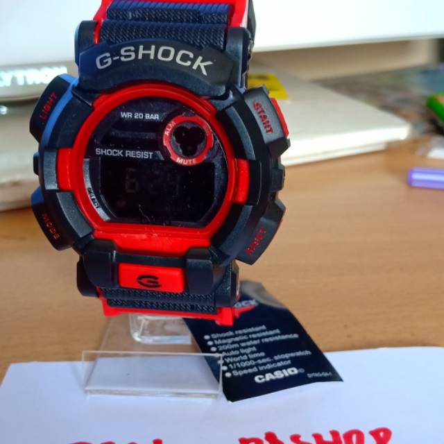 Jam G Shock merah tali hitam