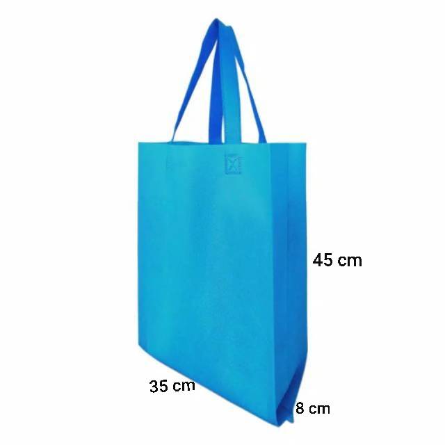 

Goodie bag /tas spunbond murah bawah flat uk (45×35×8)