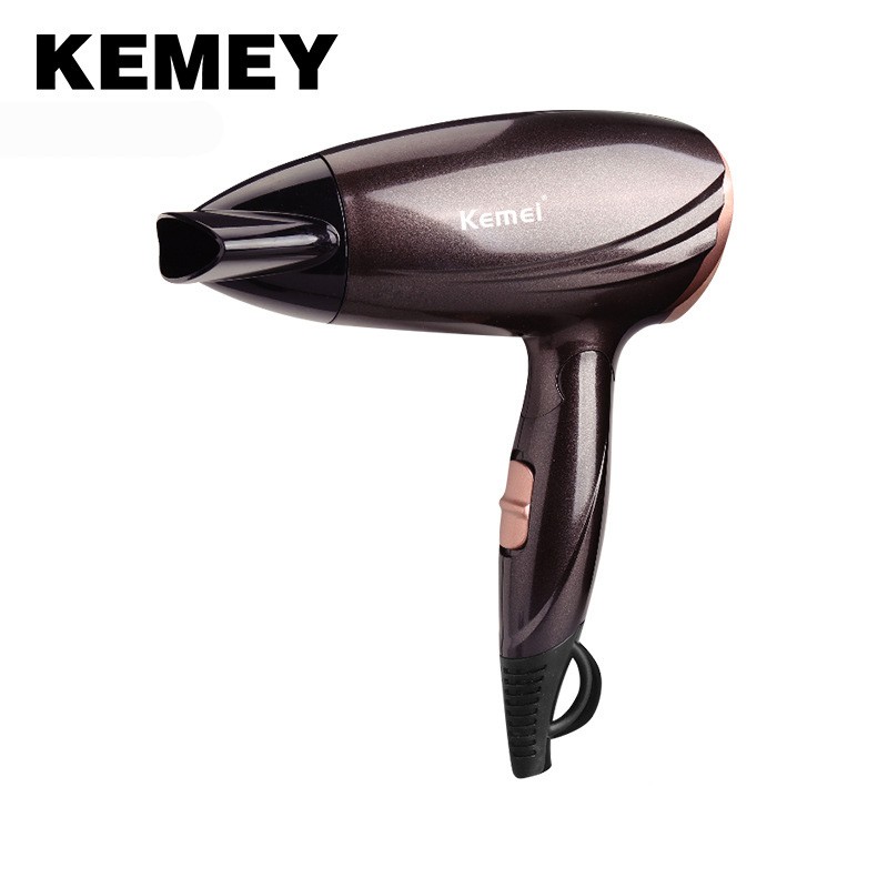 

Kemei 2000 Watt Compact Hair Dryer with Folding Handle Blow Dryer Hot and Cold Wind Hairdressing Equipment Household