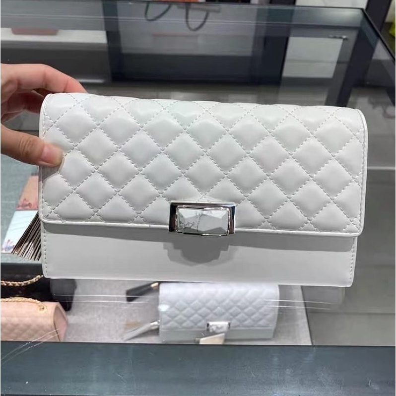 New Cnk Quilted Tassel Clutch