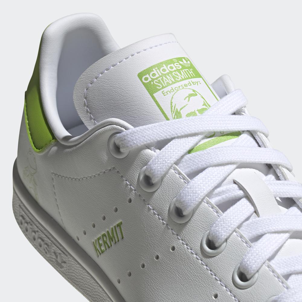white adidas sneakers with green back