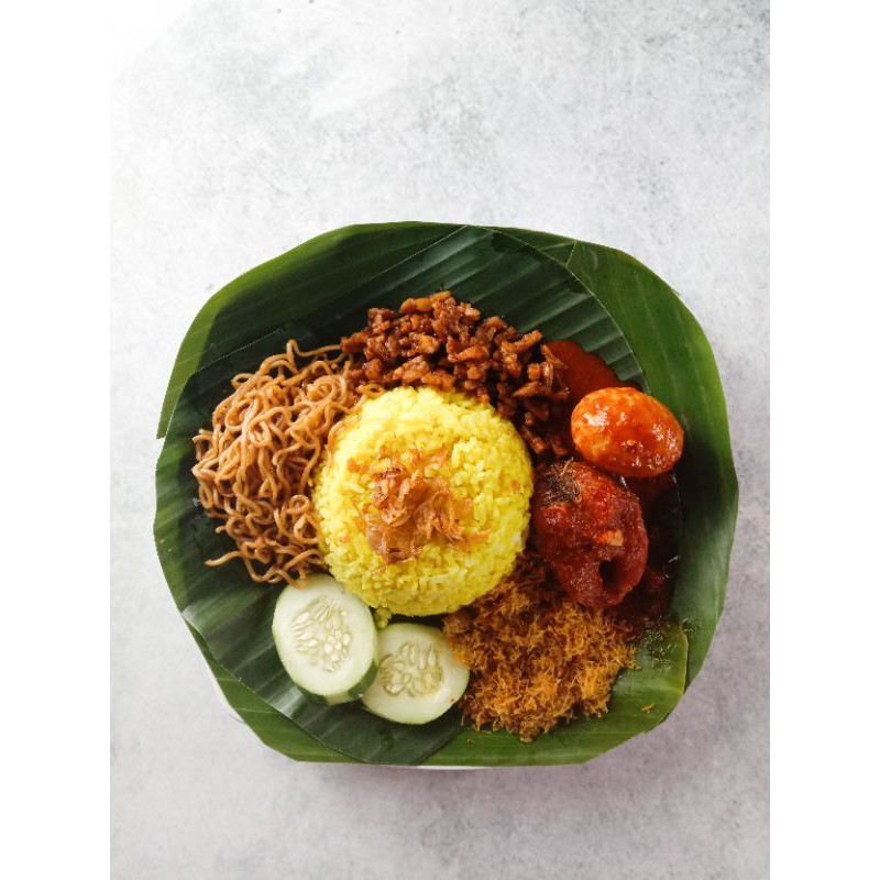 

Nasi kuning ikan haruan komplit